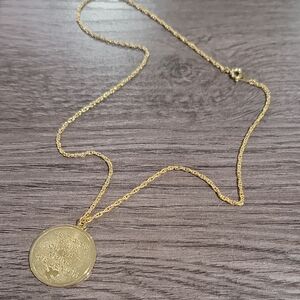 Elegant Gold Toned Pendant Necklace